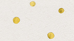 Illustration of golden painted flakes on beige background